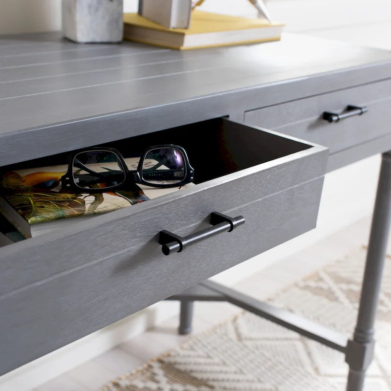 Traditional carved writing desk with 2 drawers and an open frame design, suitable for a home office.
