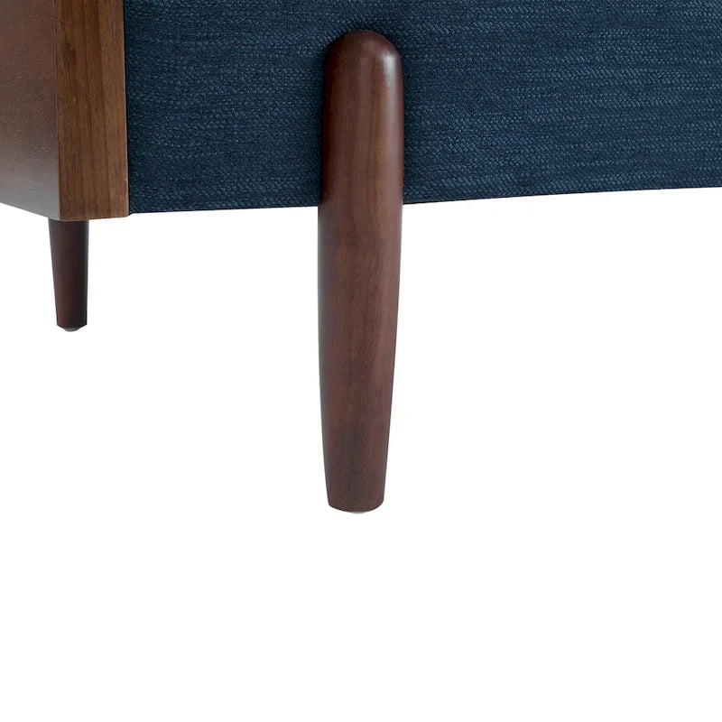 The sofa features a mid-century modern design, which is elegant and sophisticated.