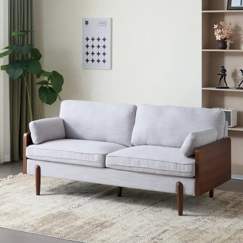 The sofa features a mid-century modern design, which is elegant and sophisticated.