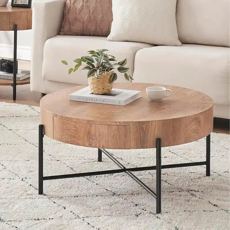 This round coffee table features high-density, high-quality MDF (medium-density fiberboard) that is waterproof and wear-resistant, paired with metal legs.