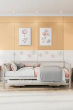 Double-size metal sofa bed with adjustable pull-out bed and pop-up trundle bed.