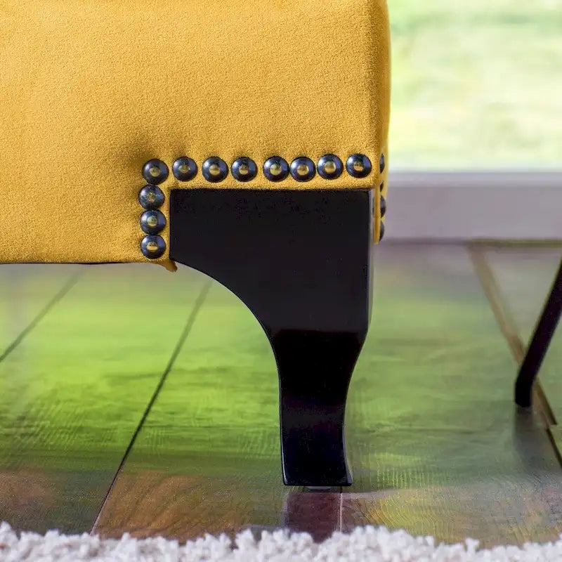 Modern velvet upholstered sofa with slanted armrests