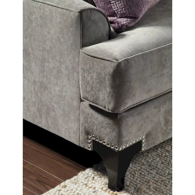 Modern velvet upholstered sofa with slanted armrests