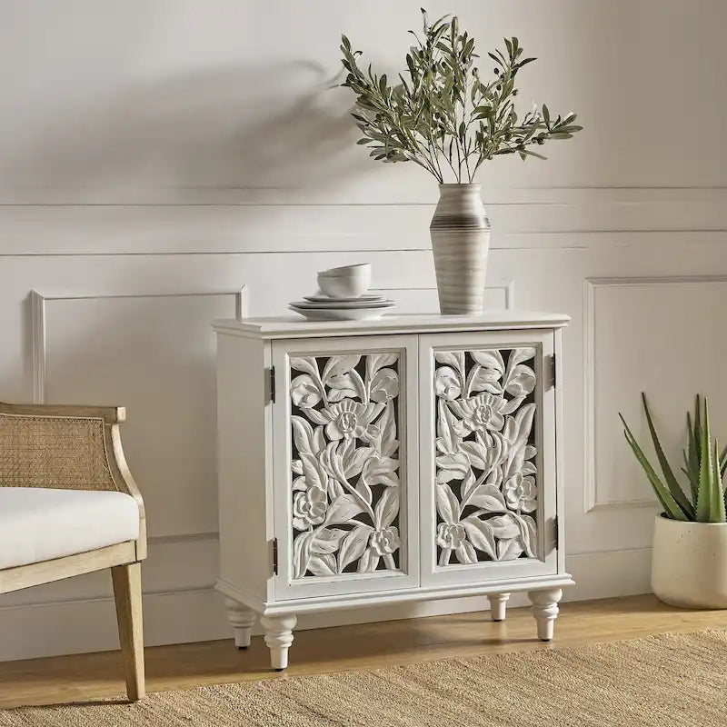 Traditional style 32-inch tall double-door display cabinet with openwork design and LED lighting.