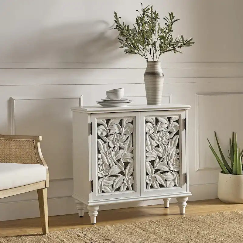 Traditional style 32-inch tall double-door display cabinet with openwork design and LED lighting.