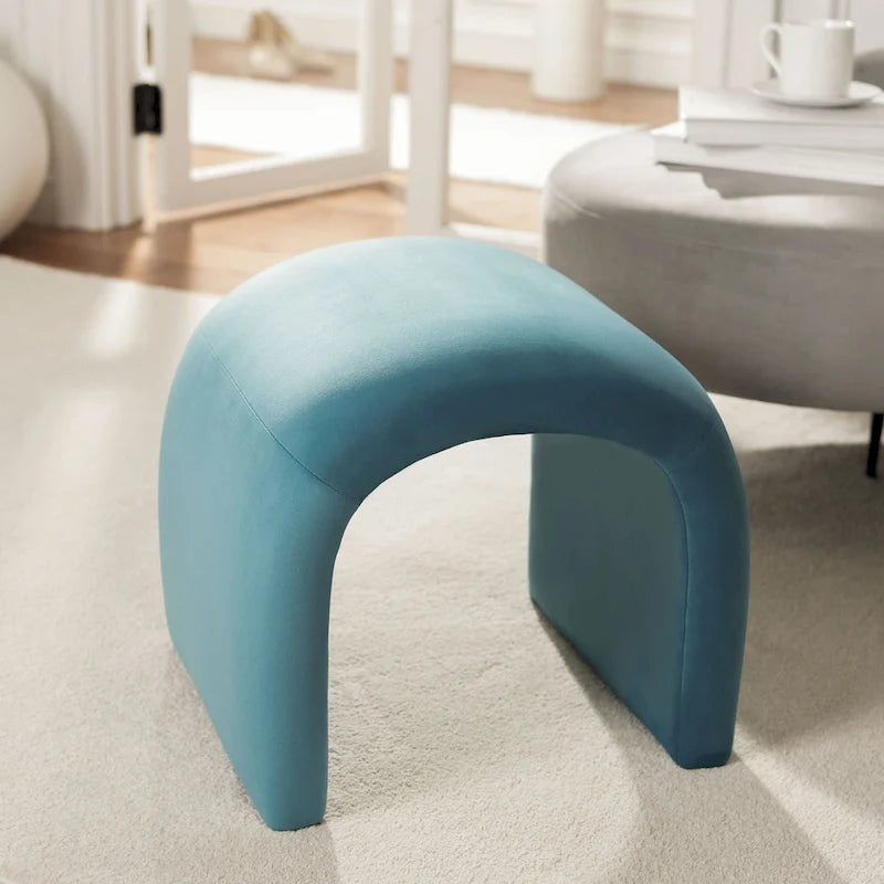 Modern Curved Velvet Ottoman for Contemporary Interiors, Plush Minimalist Accent Piece