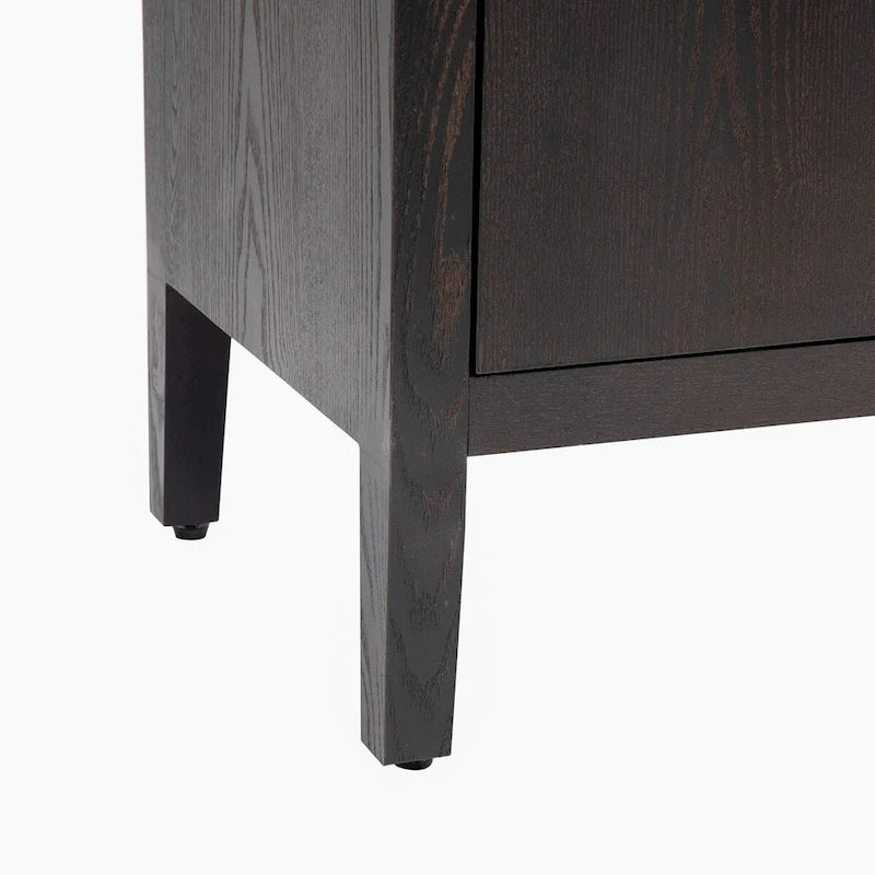 A simple, retro-style sideboard with two doors and solid wood legs.  The top has a weight capacity of 200 pounds. Assembly is required.