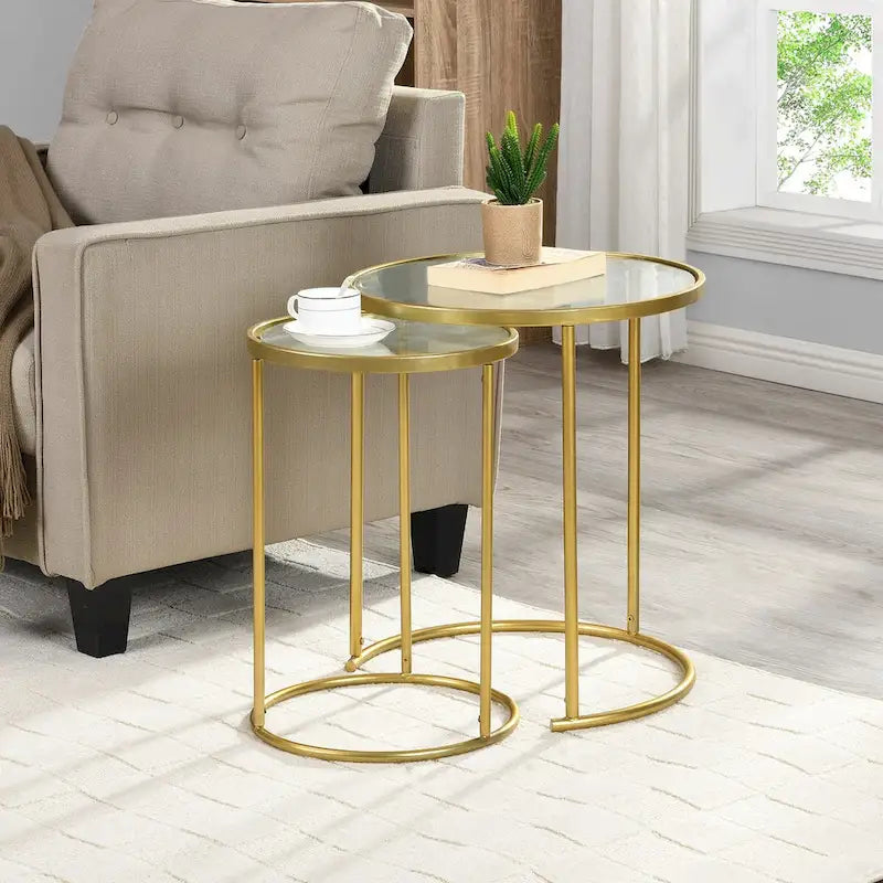 This set of two gold nesting side tables will add sophistication and charm to your room.