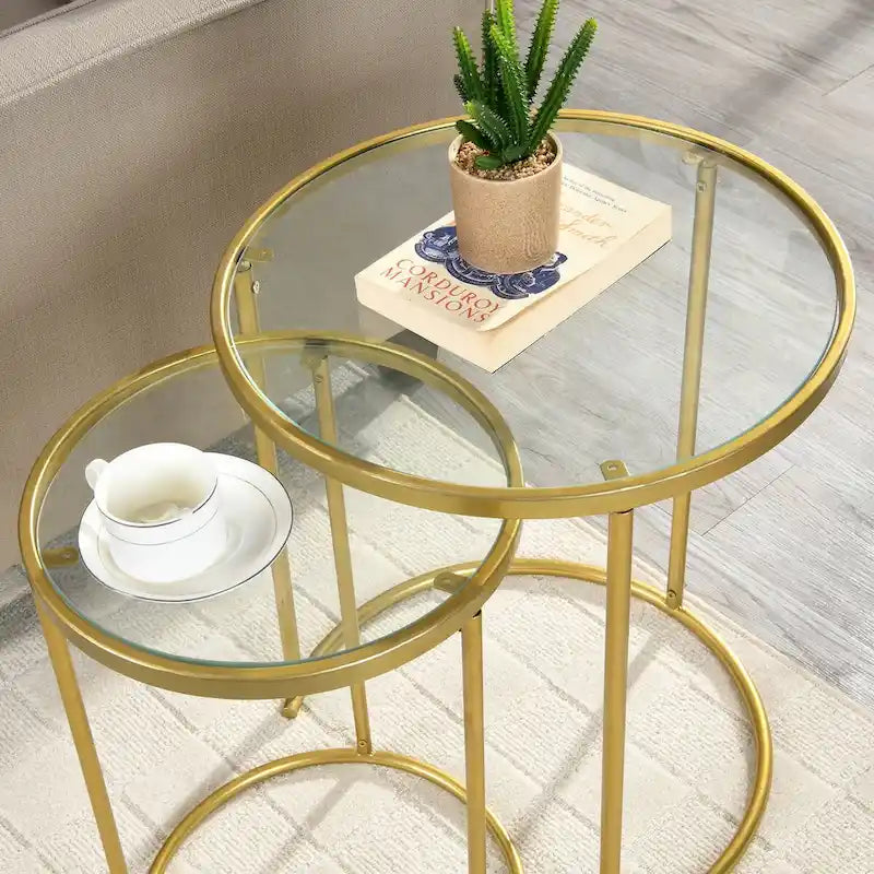 This set of two gold nesting side tables will add sophistication and charm to your room.