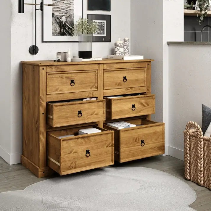 52.36 inches wide, this country-style storage cabinet features drawers in various sizes.